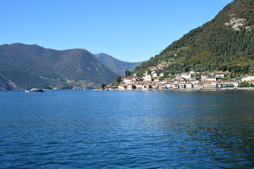 Fototapeta premium The town of Peschiera to Montisola on Lake Iseo