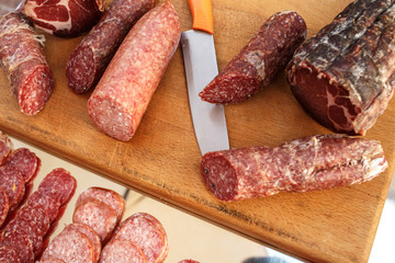 Salted meat on wooden board