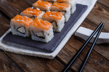 Delicious fresh rolls with salmon closeup