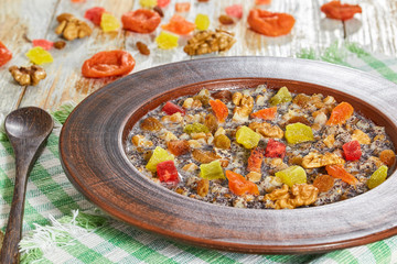 kutia with nuts, poppy seeds, dried fruits, succade and honey
