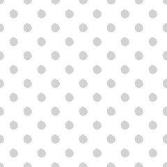 Hand-drawn polka dot seamless pattern. Light gray color. Simple and nice.
