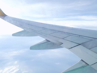 Obraz premium clouds and sky as seen through window of an aircraft