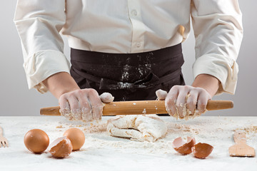 Hands kneading a dough