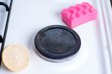 Detergents for the kitchen are on the stove