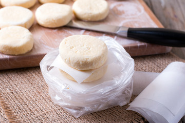 uncooked syrniki (Cottage cheese pancakes) in bags