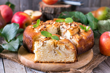 piece of homemade apple pie on a wooden table