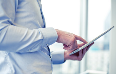 businessman with tablet pc in office