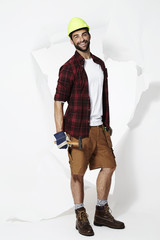 Construction worker with hammer, portrait