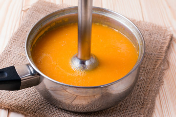 Pumpkin pureed for soup with blender