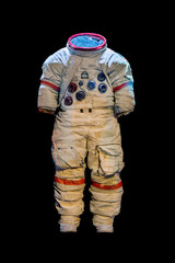 empty suit of an astronaut on a black background © milkovasa
