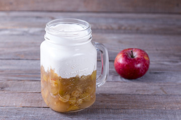 Sweet yogurt on a wooden background