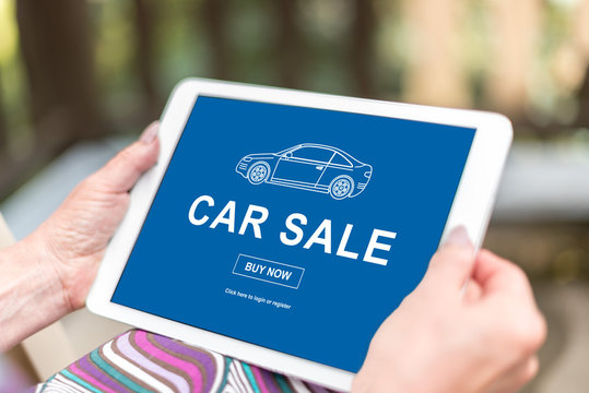 Car sale concept on a tablet