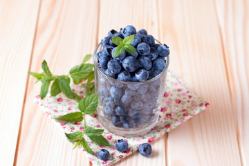 Fresh blueberries in a glass