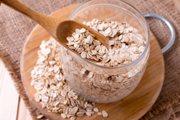 Raw oatmeal in a glass jar