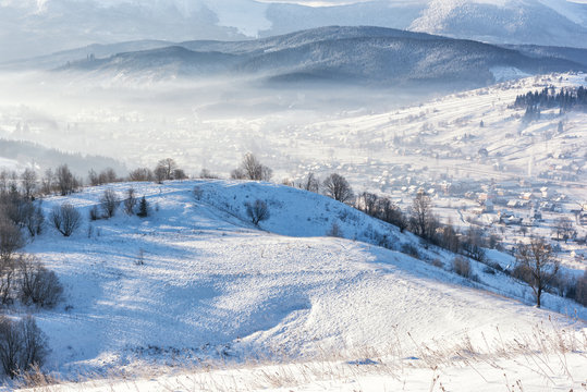 Winter at the Carpathian mountains, snowy alpine countryside landscape