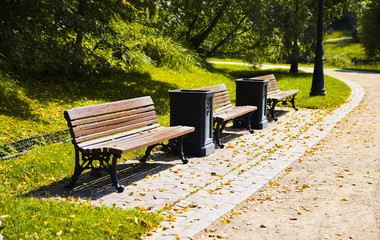 Benches with garbage urns in the city park
