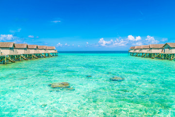 Beautiful water villas in tropical Maldives island  .