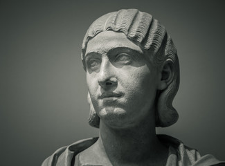 Head and shoulders detail of the ancient sculpture