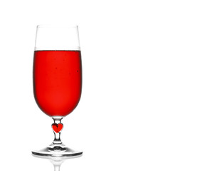 front view red wine chilled in clear glass with steam and heart