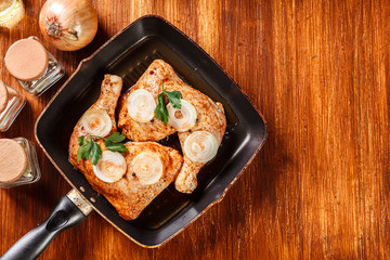 Raw chicken legs marinated