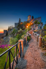 San Marino. Image of castle in San Marino during sunset. - obrazy, fototapety, plakaty