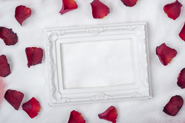 decorations and frame laying on the Snow and Rose petals