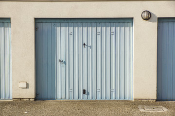 Garage wall facade with metal door background texture