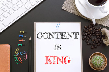 Text Content is king on white paper background / business concept