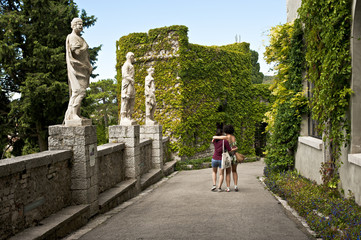 Two young sisters visit the Duino Castle near Trieste in Italy.