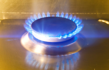 The burning torch on the gas stove
