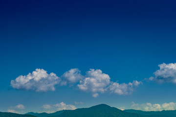 Mountain with white cloud on Blue sky