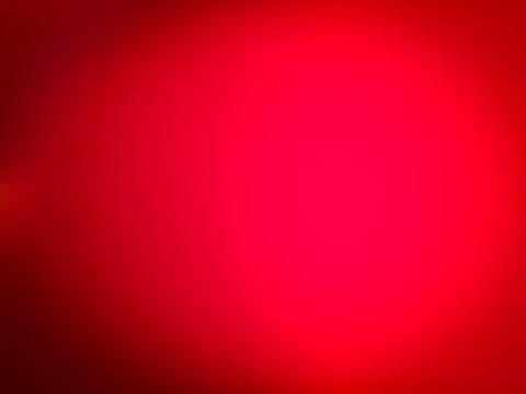 Blurry grungy abstract pink red background. Blurred surface
