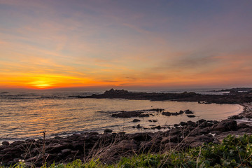 Fototapeta premium Coucher de soleil sur plage bretonne