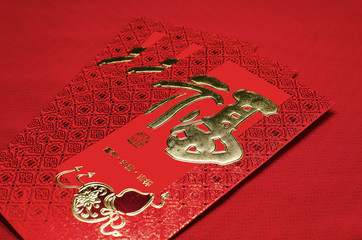 Red envelope in chinese new year festival on red background.