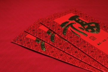 Red envelope in chinese new year festival on red background.