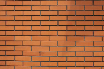 Brick wall texture background. Orange bricks grunge pattern.