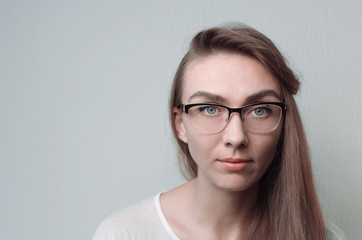 Young woman in glasses. Portrait