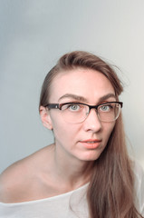 Young woman in glasses. Portrait