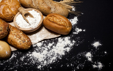Assortment of baked goods on black table