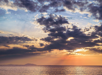 Seascape with sunset blue and yellow sky in the evening.