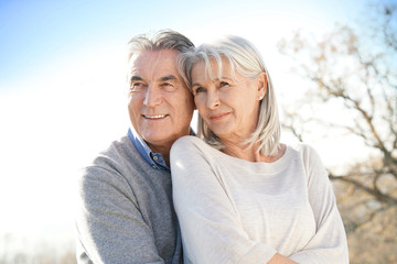 Fototapeta premium Portrait of senior couple embracing each other