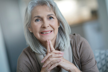 Portrait of beautiful senior woman with white hair