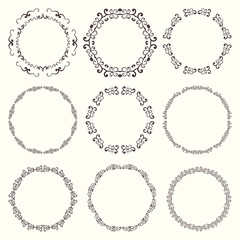 Set of nine elegant vintage round frames.