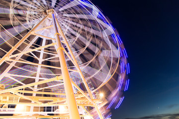 Fototapeta na wymiar Ferris wheel at evening