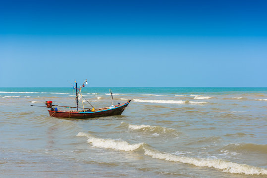 Boat on the beach at afternoon