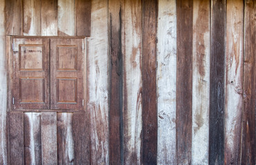 Old wooden wall and close window