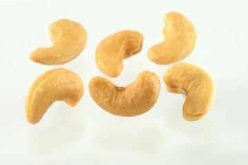 cashew nuts heap on white background