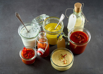 Various sandwich condiments bunched together