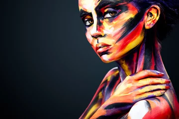 Fotobehang Portrait of the bright beautiful girl with art colorful make-up and bodyart © Mike Orlov