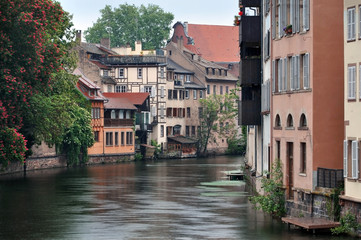 Fototapeta na wymiar The old half-timbered houses of Strasbourg, near the water, France.